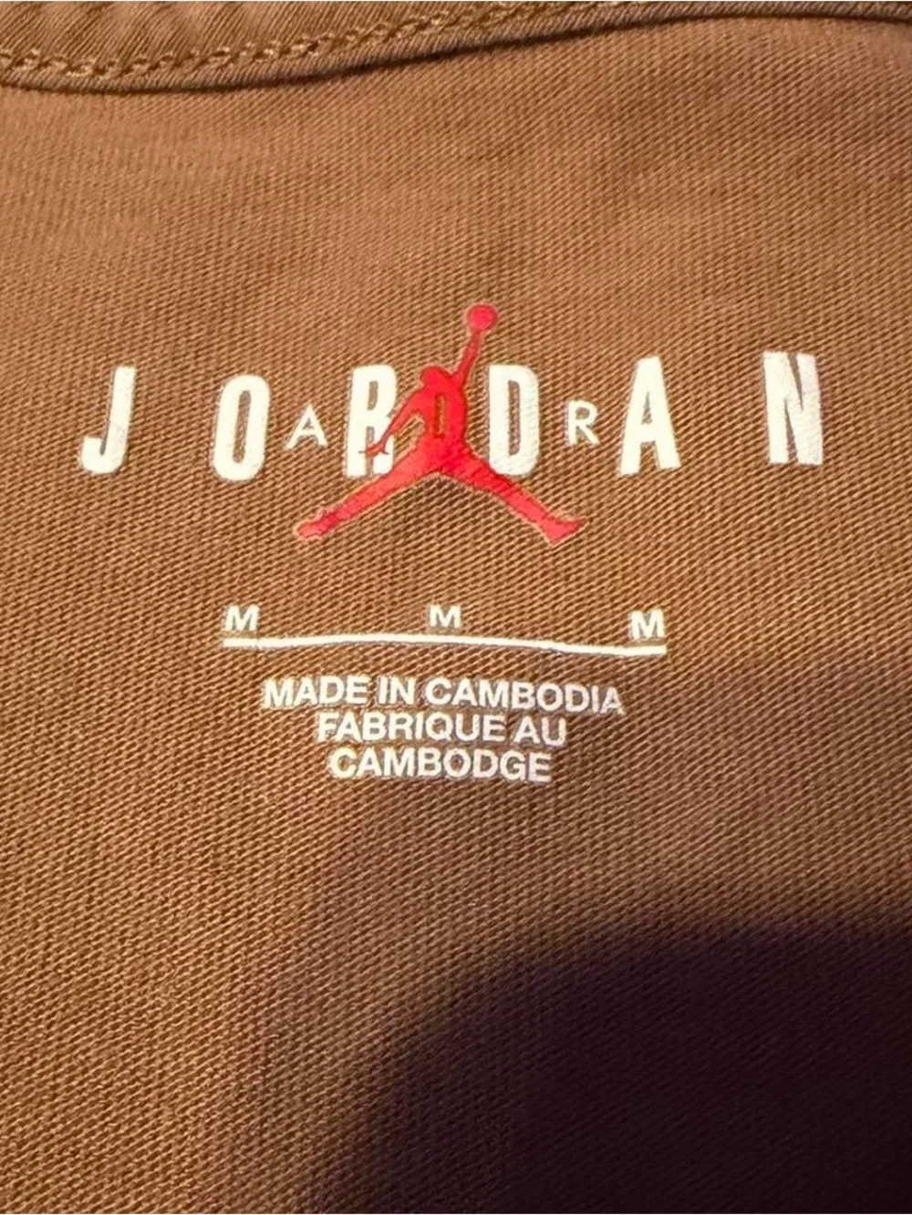 Jordan Brown Short Sleeve Tee with Yellow Jumpman Graphic